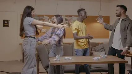 Horizontal video: Friends hugging in a living room 8058107. Duration: 19 seconds. Resolution: 3840x2160