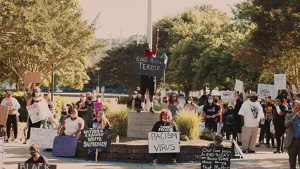 Horizontal video: People protesting and holding placards 4632581. Duration: 22 seconds. Resolution: 3840x2160