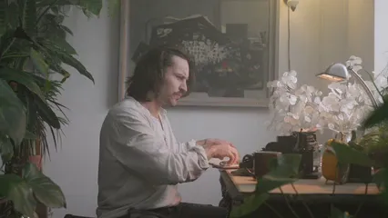 Horizontal video: A man reading a letter with a magnifying glass 6979934. Duration: 30 seconds. Resolution: 3840x2160