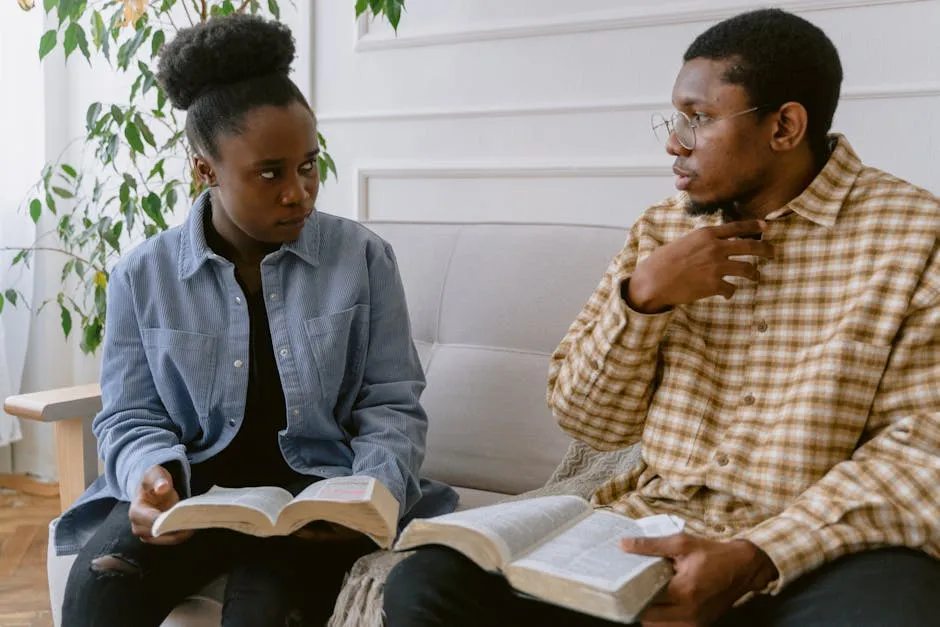 A Man and a Woman Holding a Book