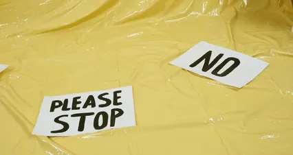 Horizontal video: Female protester holding a megaphone 6484605. Duration: 15 seconds. Resolution: 4096x2160